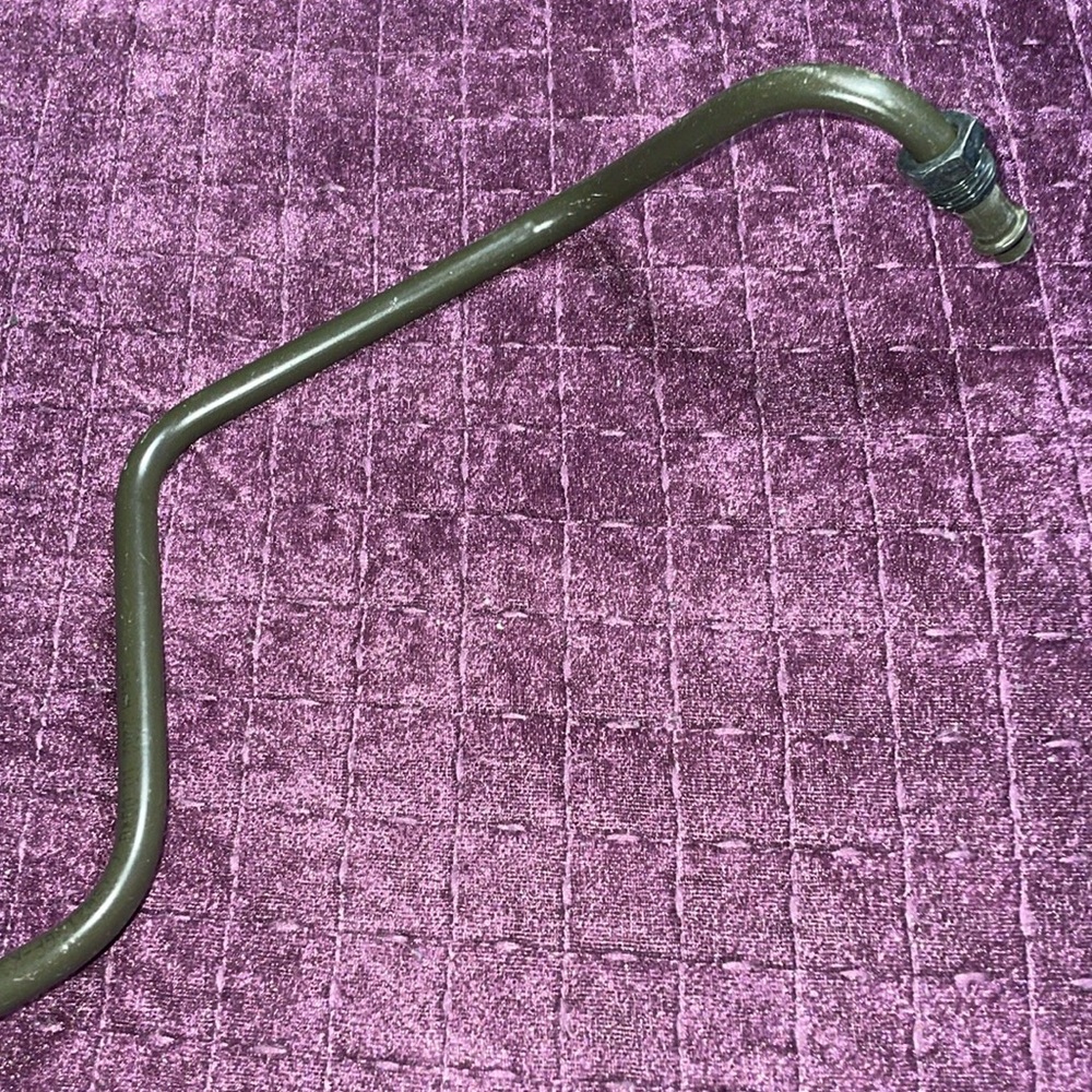 Hyundai Accent hose pressure line metal and rubber missing model tag